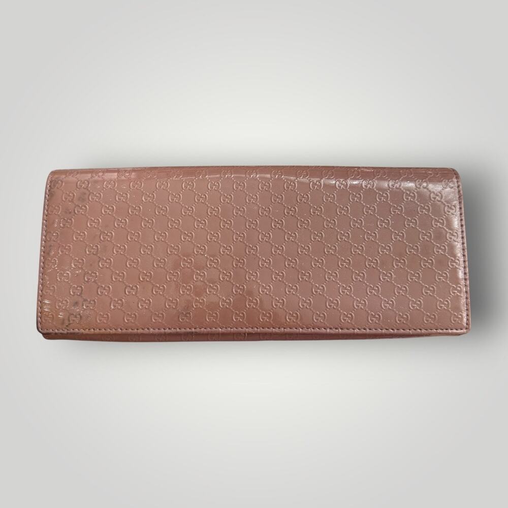 Gucci Pink Embossed Leather Clutch